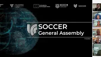 Graphic with text "SOCCER General Assembly".