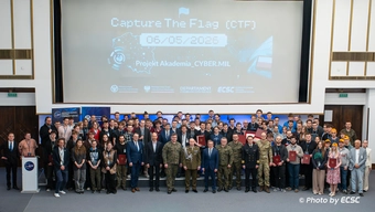 Large group of people posing for group photo.