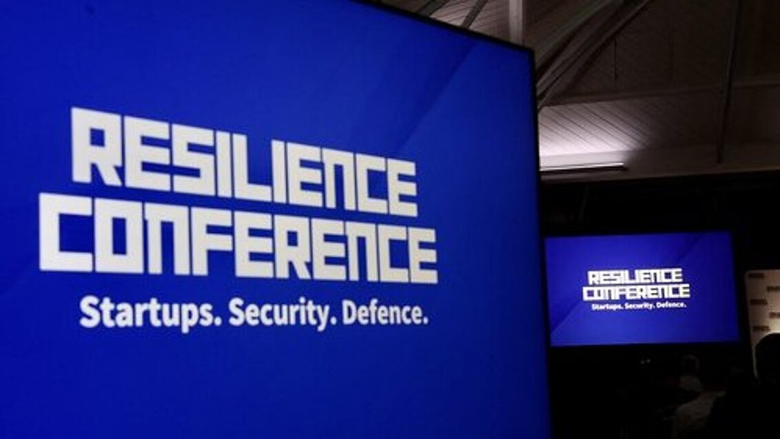 Text "Resilience conference" on blue background.