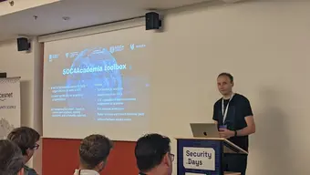 Man presenting in a conference room